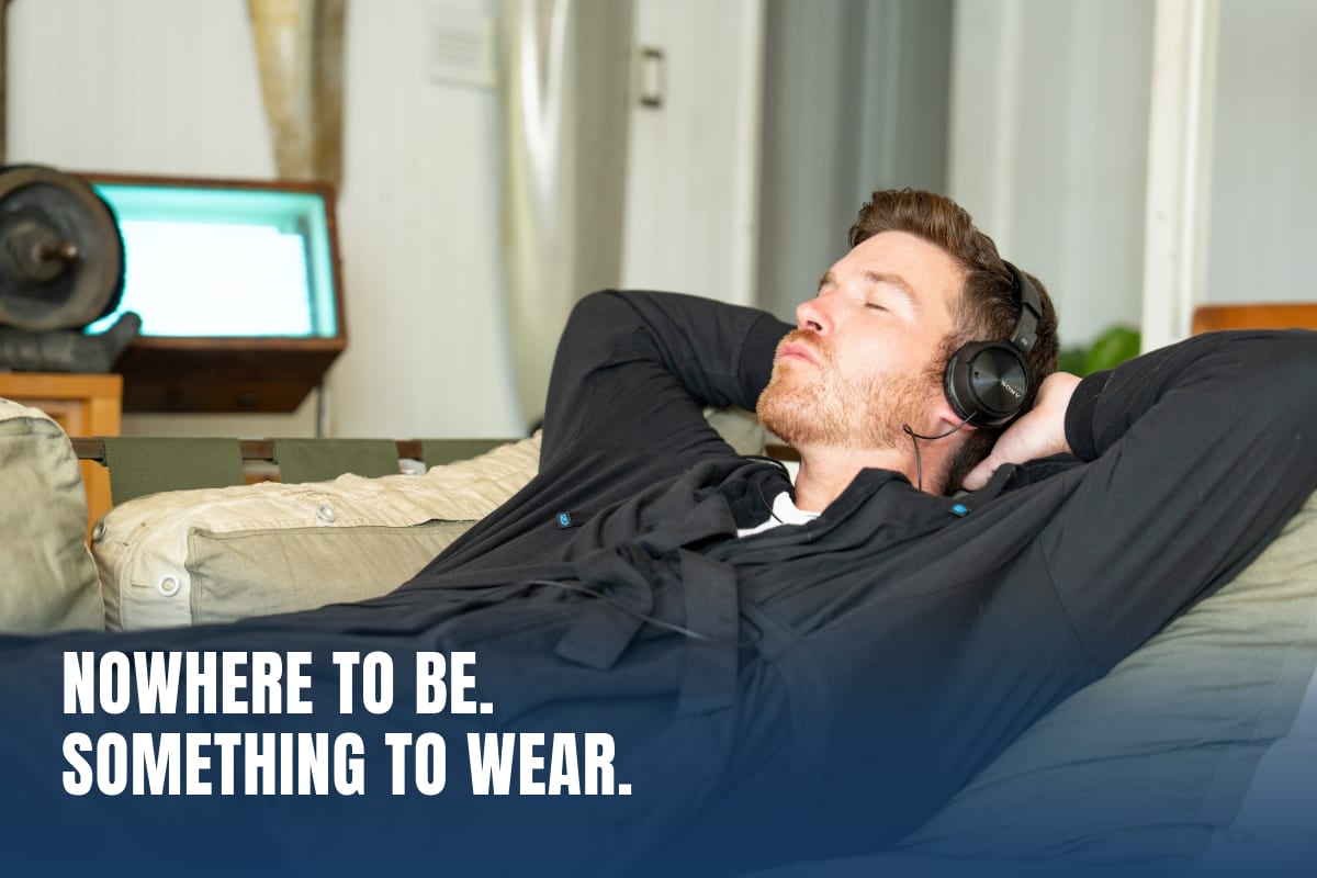 Nowhere to be. Something to wear. Man relaxing on the couch in the DudeRobe.