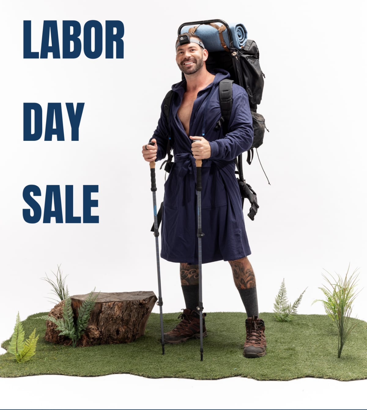 Labor Day Sale hero — man in navy DudeRobe outdoors with LABOR DAY SALE headline baked into the image